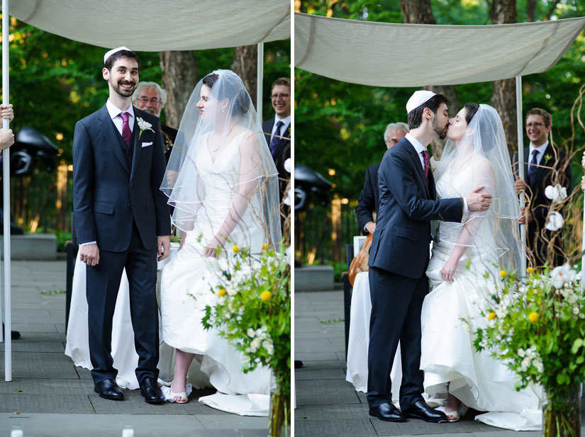 first kiss and breaking of the glass at baltimore museum of art jewish wedding