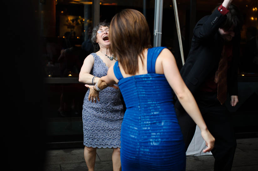 mom laughing and dancing at baltimore museum of art wedding