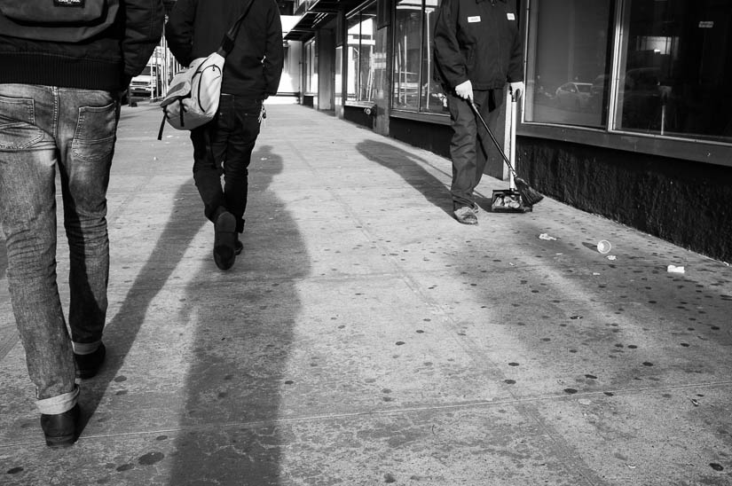 shadows and street cleaner street photography