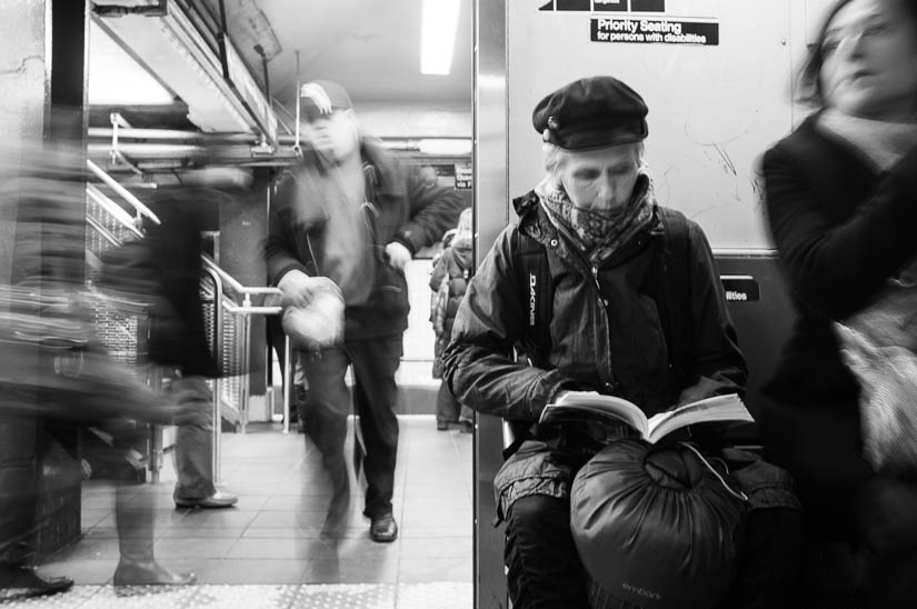 lady in the subway with motion blur