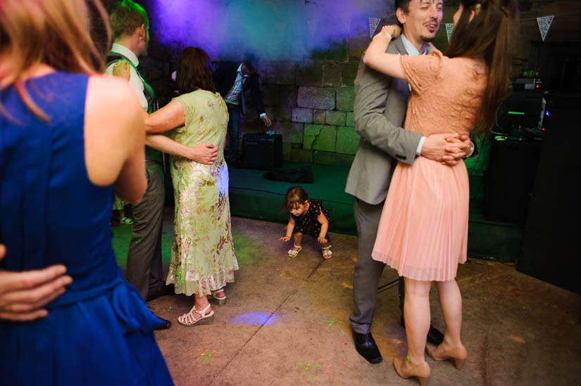 little girl dancing at danby castle wedding