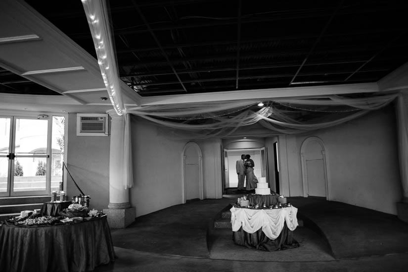 bride and groom kissing before they are announced