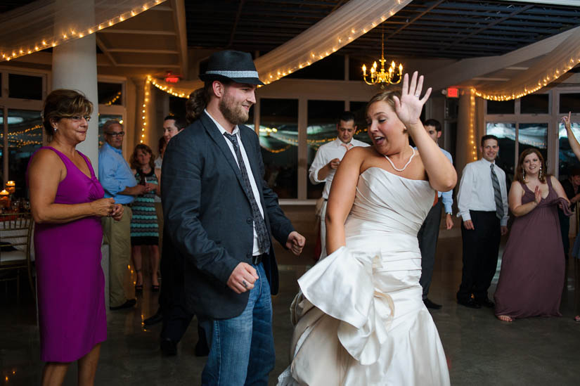 bride and friend dancing at love point wedding