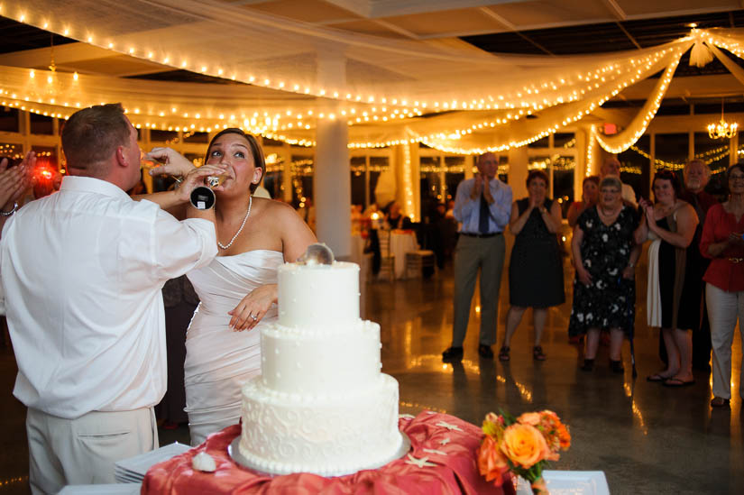 bride and groom sharing champagne at maryland eastern shore wedding