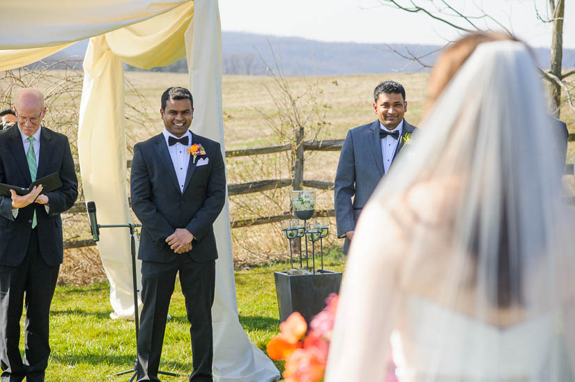 groom greeting his bride at comus inn