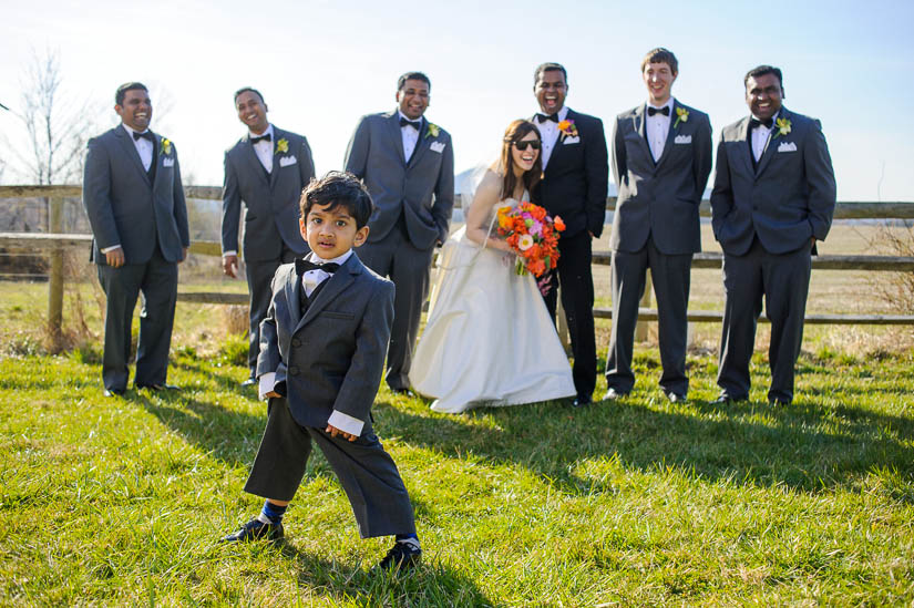 ring bearer stealing the show during wedding formals