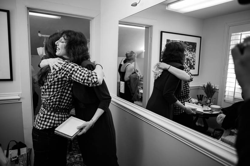 bride and her mother hugging at comus inn