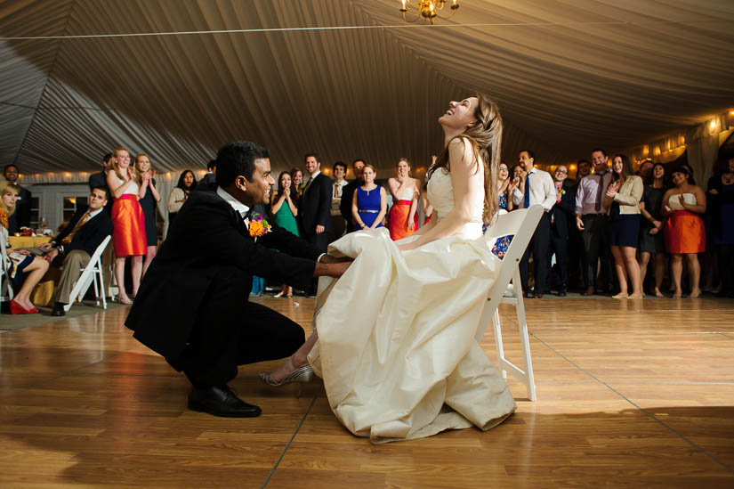 getting the garter at comus inn wedding