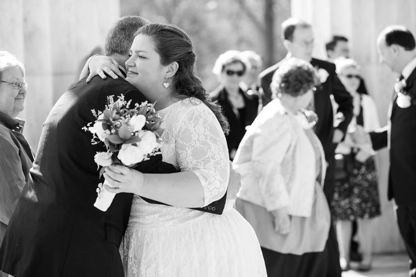 hugging at dc war memorial wedding