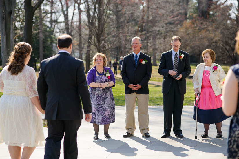 greeting their parents at dc war memorial wedding