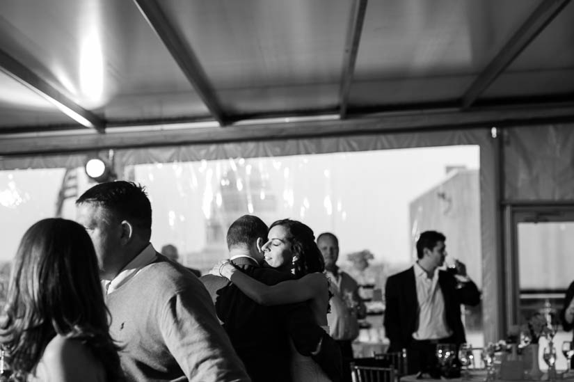 bride and groom dancing at flying bridge wedding