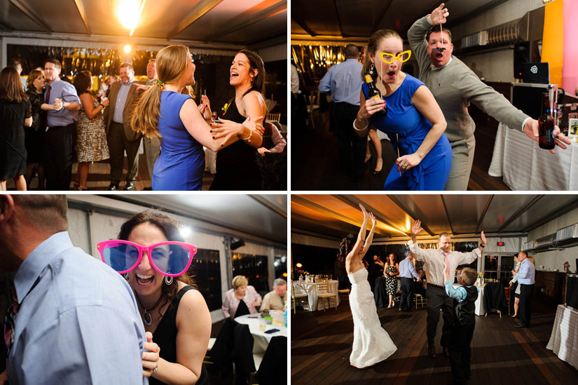 dancing with photobooth props at flying bridge wedding