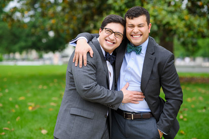 brothers hugging during wedding portraits