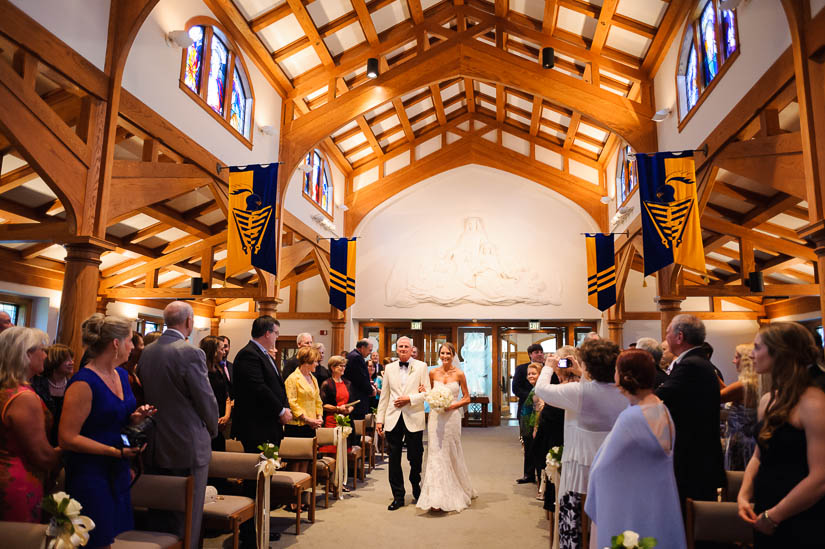 bride walking down the aisle at Loyola Blakefield church