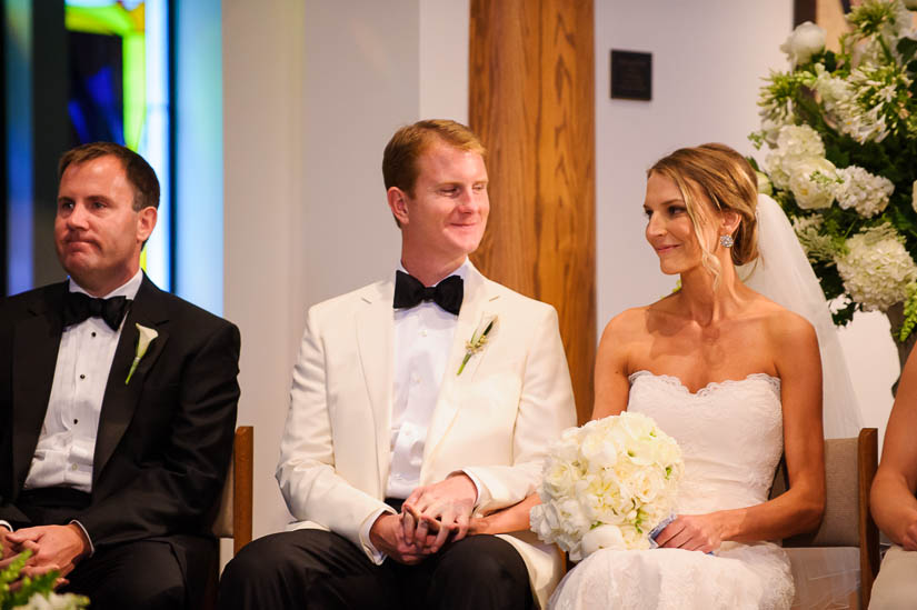 bride and groom during the catholic wedding ceremony