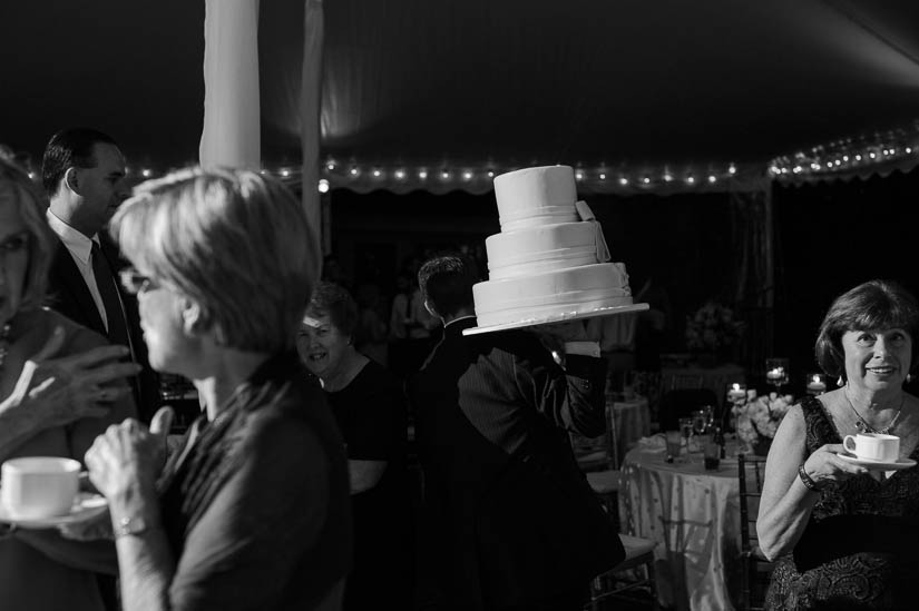 taking the cake to be cut at green spring valley hunt club wedding