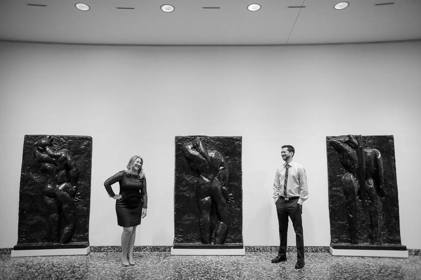 cracking up during engagement photo shoot in the hirshhorn