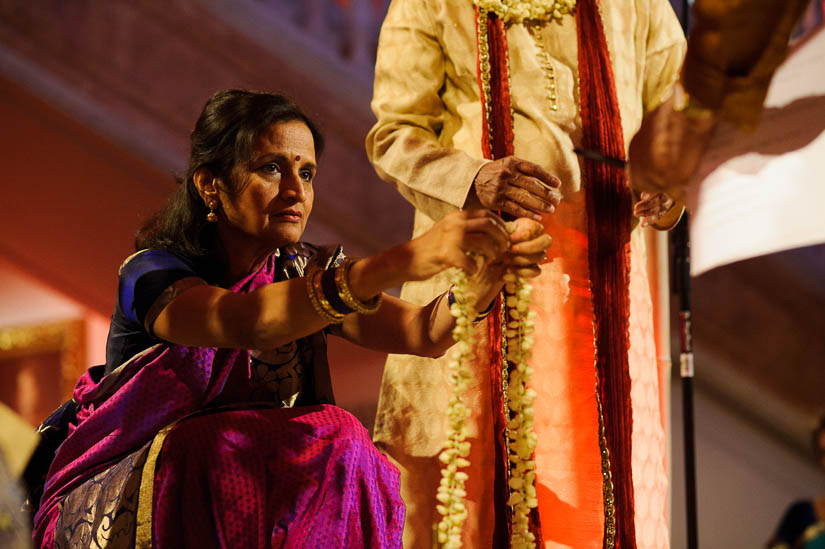 mother of the groom cuts the garland at nmwa hindu wedding