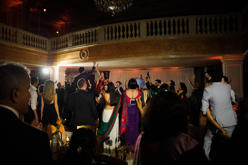 bride and groom at national museum for women in the arts dance party