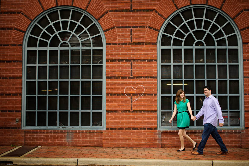 heart on a wall for engagement photos at old town alexandria