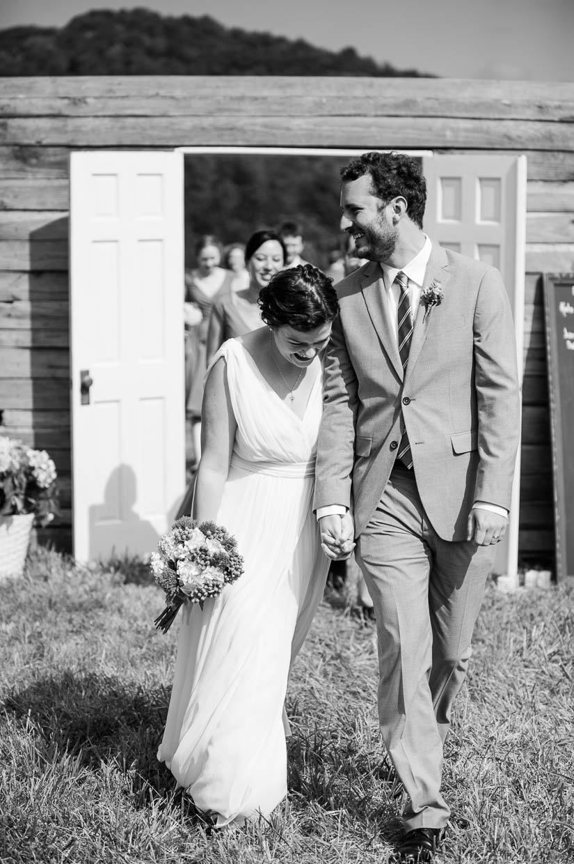 excitedly leaving the wedding ceremony in charlottesville