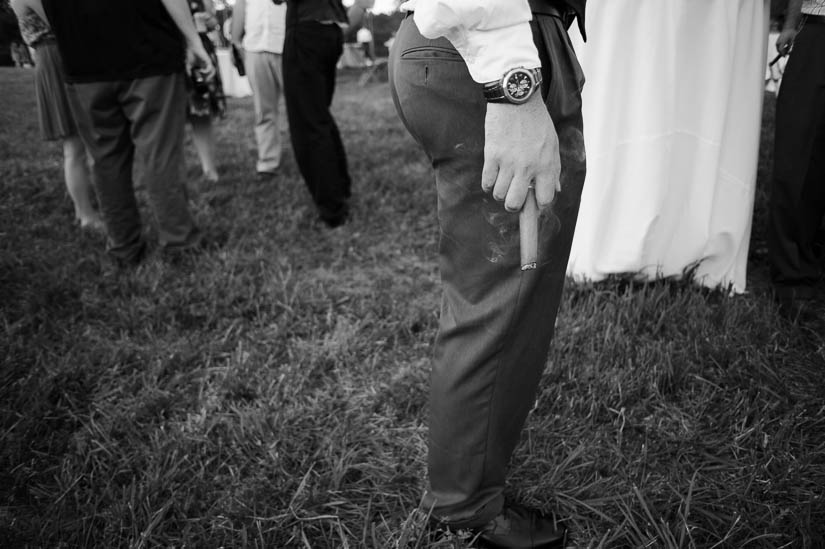 smoking cigars at the wedding in charlottesville