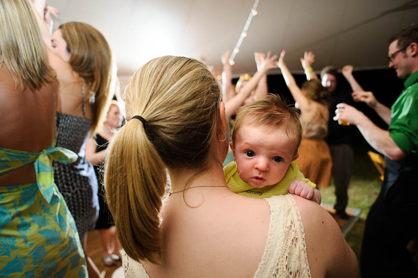 baby taking in the dance floor at charlottesville wedding