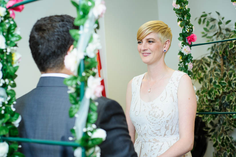 bride looking at her groom at dc courthouse wedding