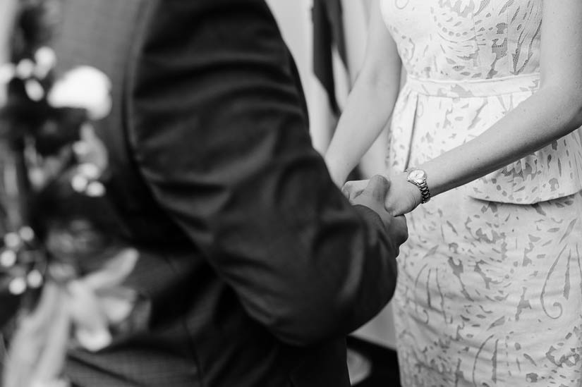 holding hands at dc courthouse wedding