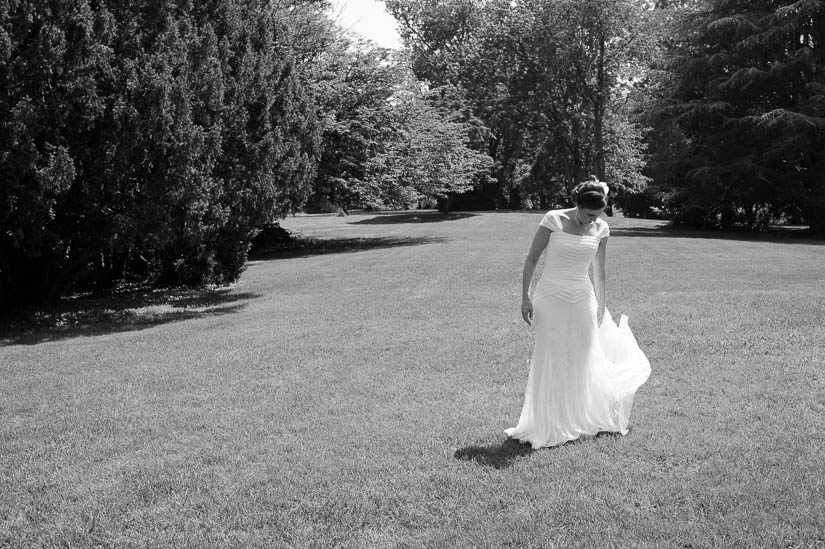 bride on the lawn at historic rosemont manor wedding