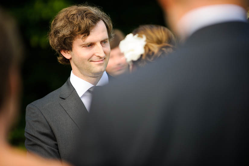 groom looking at his bride at historic rosemont manor wedding