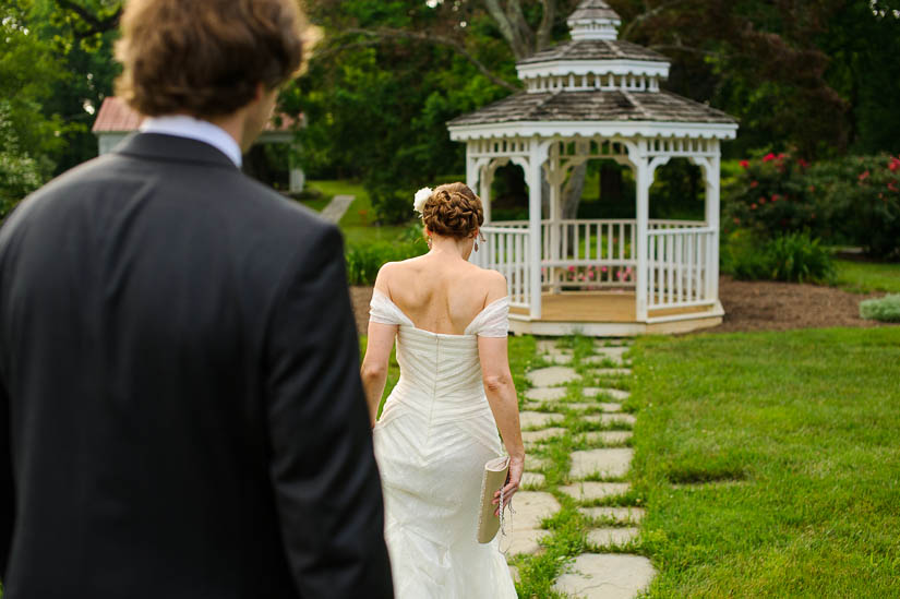 bride and groom walking to the gazebo