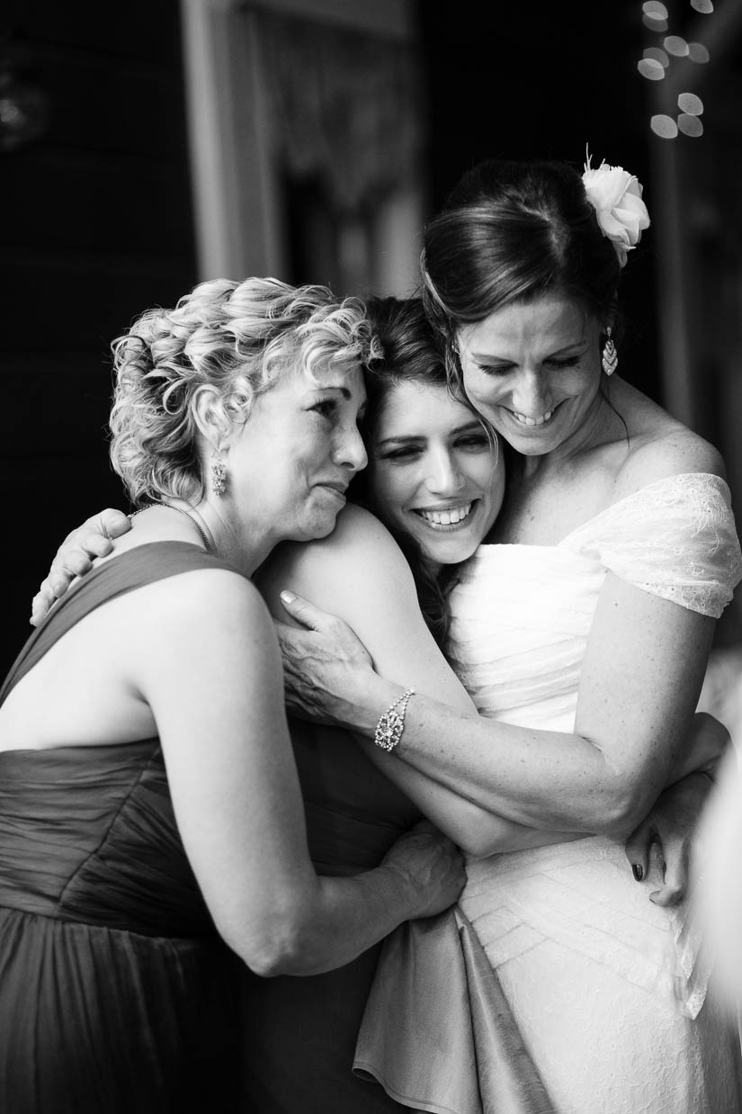 bride with her sisters at historic rosemont manor wedding