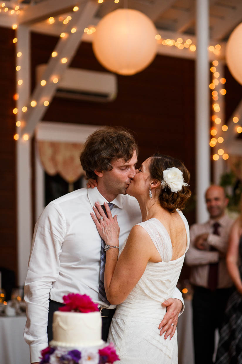 cutting the cake at historic rosemont manor wedding