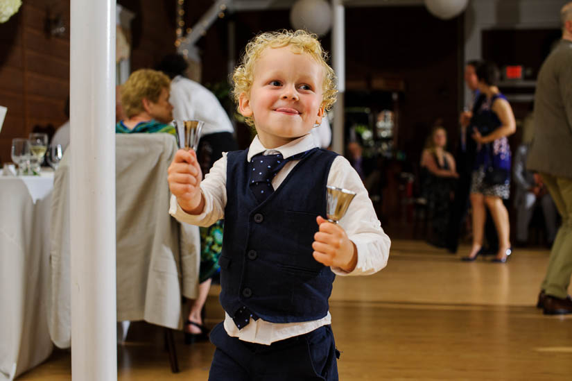 little boy ringing bells at historic rosemont manor wedding