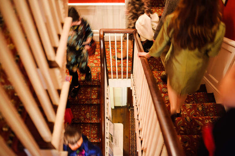 motion blur as guests move downstairs at arts club of washington wedding