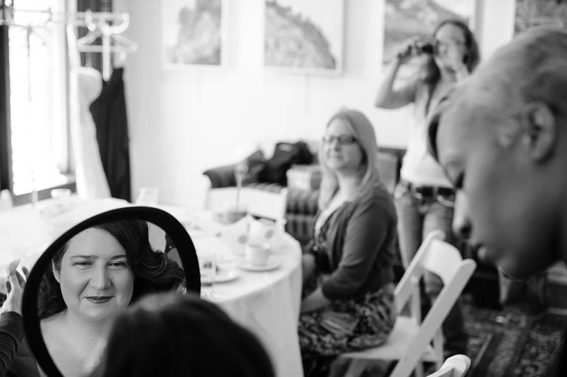 bride seeing her hair done at arts club of washington wedding