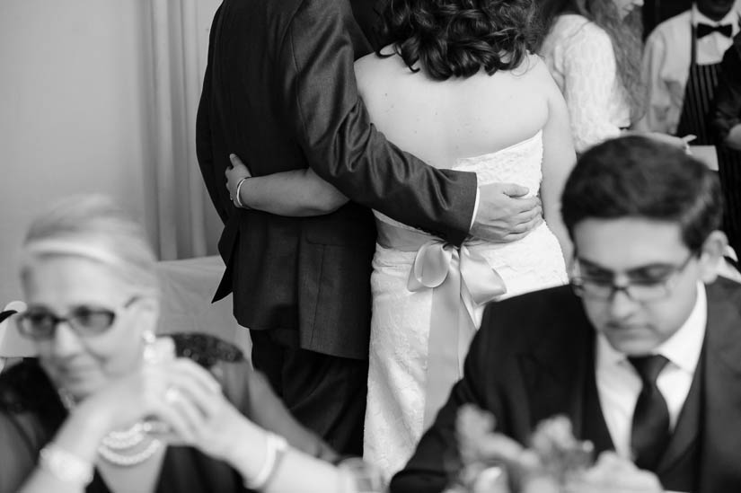 bride and groom holding each other at arts club of washington wedding