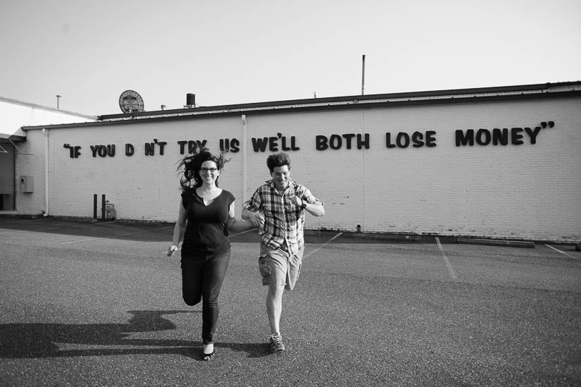 ridiculous engagement photo session with used car dealer