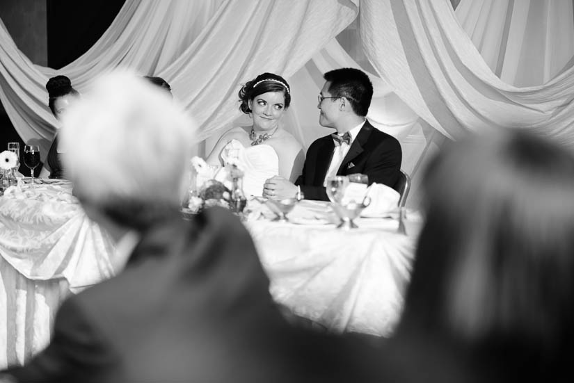 bride and groom sharing a glance at Crowne Plaza Crystal City wedding