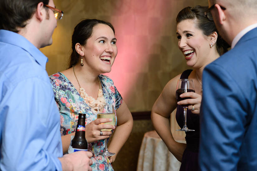guests laughing together at arlington wedding