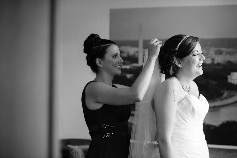 putting on the bride's veil at Crowne Plaza Crystal City wedding