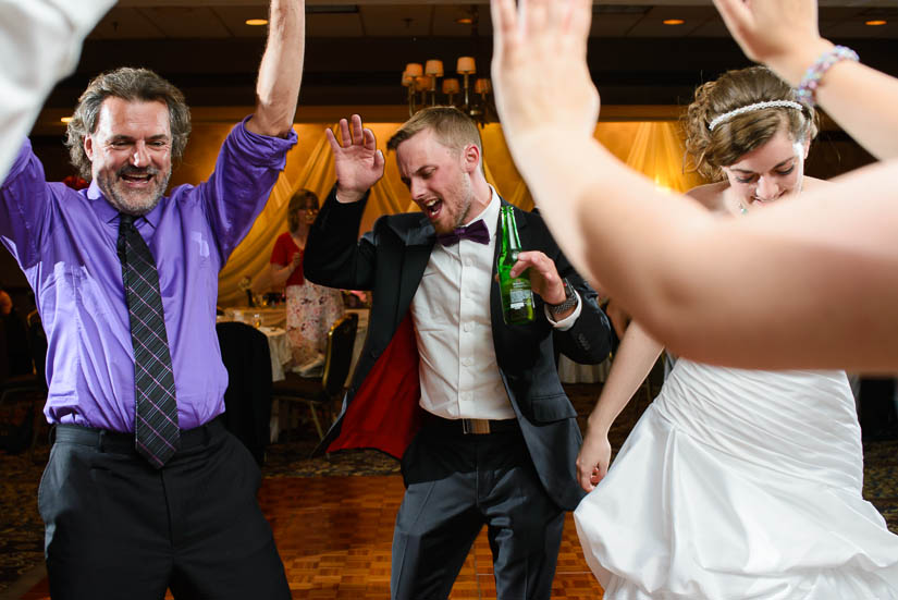 bride's family doing the time warp at Crowne Plaza Crystal City wedding