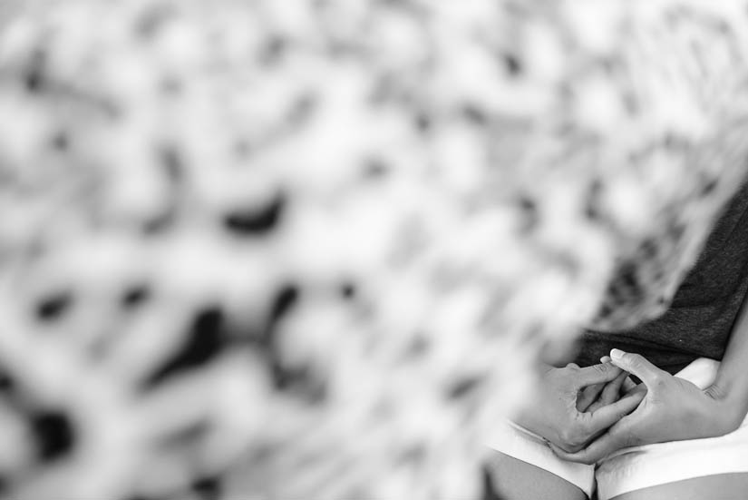 bride's hands as she has her makeup done