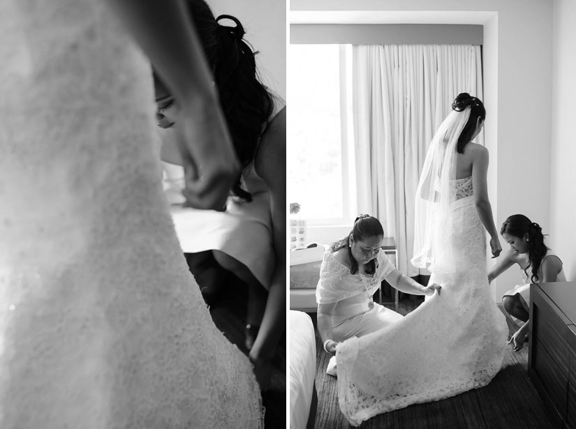 bride putting on her dress at the hilton tysons corner