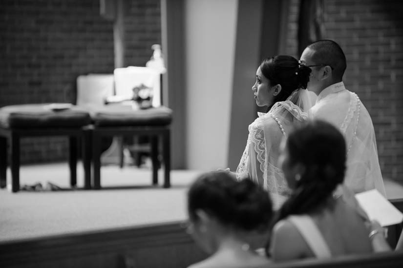 bride looking pensive during wedding ceremony