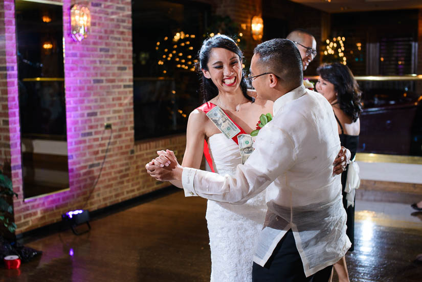 bride dancing during the "money dance"