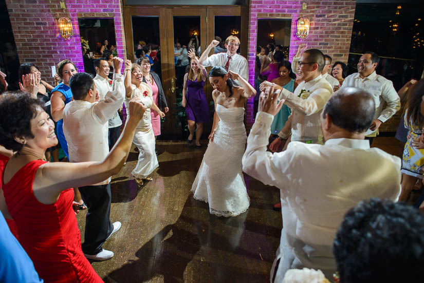 bride and groom dancing at grand atrium wedding