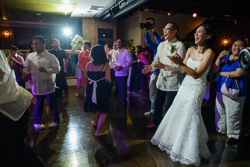 bride and groom reacting to the flash mob