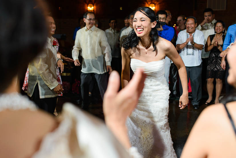 bride laughing at the grand atrium wedding reception